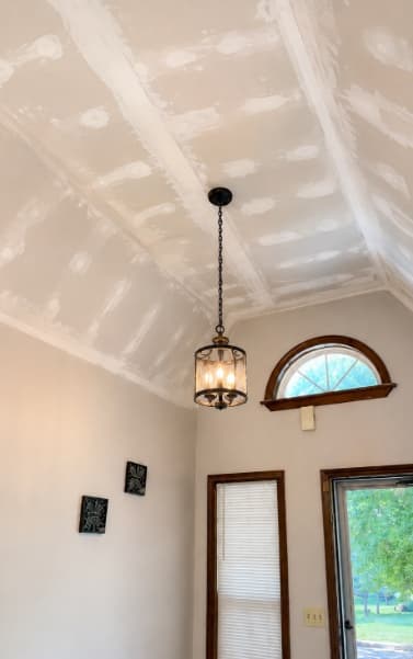 Vaulted ceiling with newly finished drywall seams